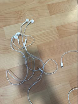 2 pair of apple headphones