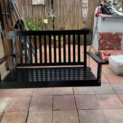 Black Wooden Swing Bench, 47 Inches Across and the back of the bench is 20 inches up and down