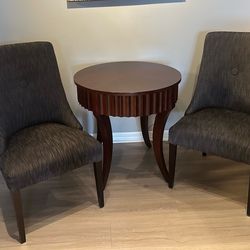 Two gray upholstered chairs