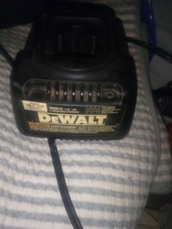 +1
This is a DeWalt DW9116 1-Hour NiCd battery charger designed for 7.2V-18V batteries.