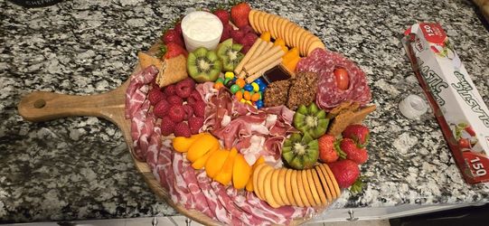 Elegant  Fresh Large Charcuterie Board feeds 10 people with sorted cheese, cold cuts, nuts and more. 