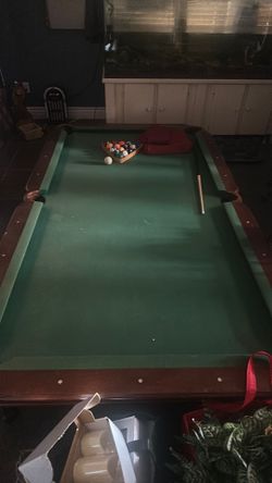6 foot pool table with new red felt