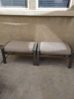 Two outdoor ottomans with Sunbrella cushions