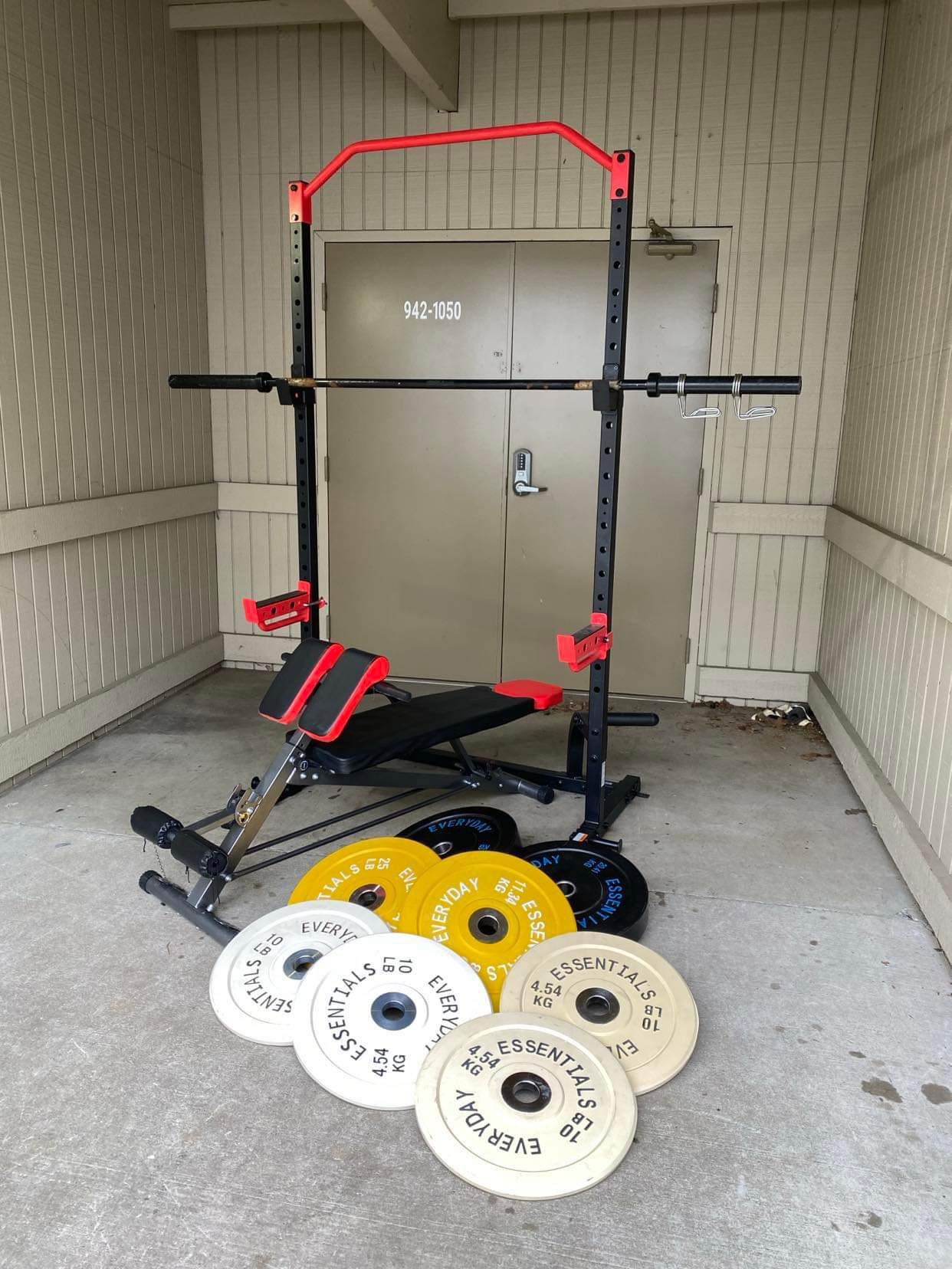 Squat Rack With Barbell Bumper Weights Bench 