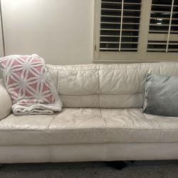 white vintage leather couch 