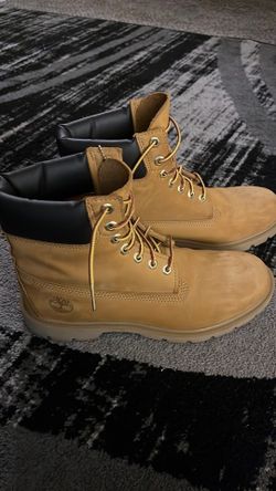 tan timberlands, size 8 in men’s with water resistant spray