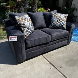 Brand New. Lane sofa. Slate color with accent pillows. Only 1 available. $399 