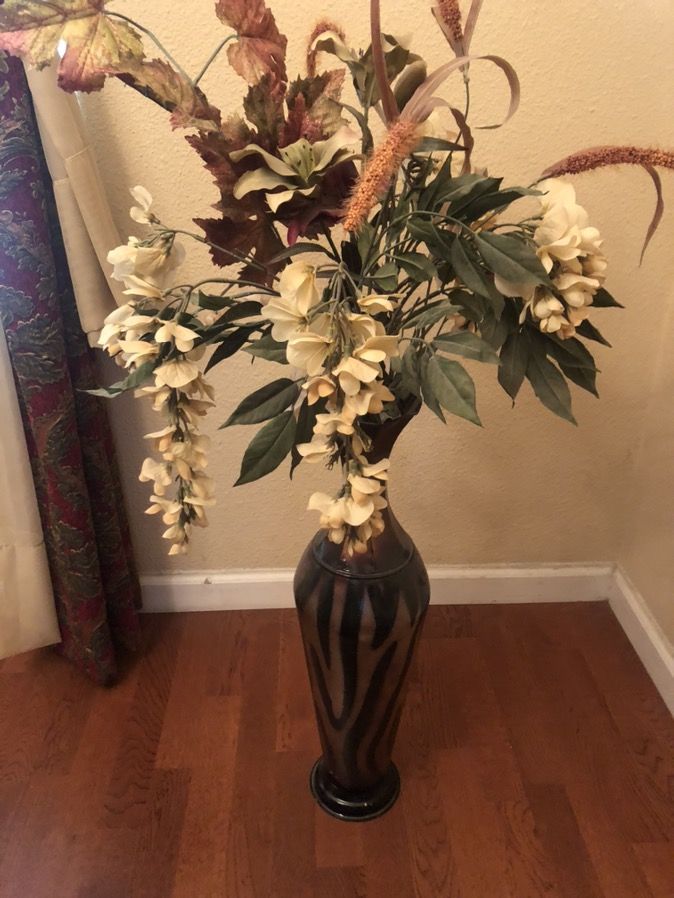 Vase with flower arrangement