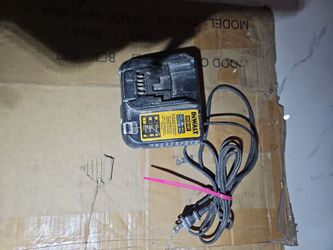 DEWALT 12V. - 20V.  BATTERY CHARGER  USE IN GOOD WORKING CONDITION