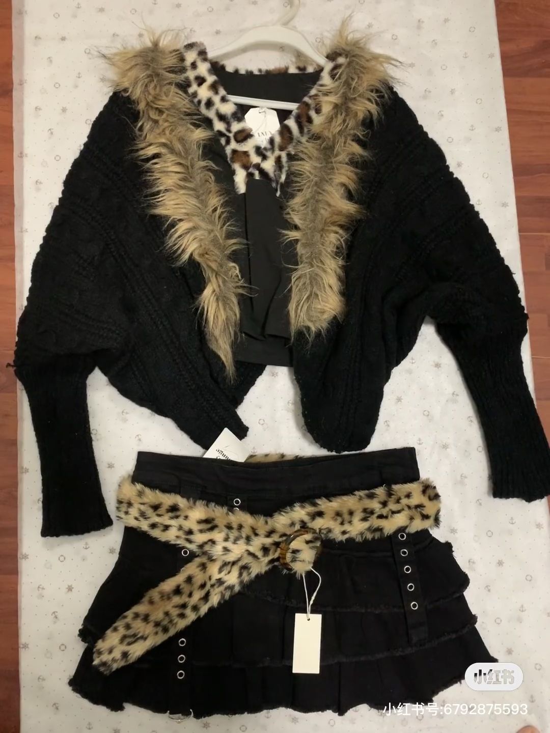 Multi-coloured crochet cardigan with faux fur trim