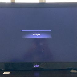 32” Vizio With DVD Player And 20+ DVDs