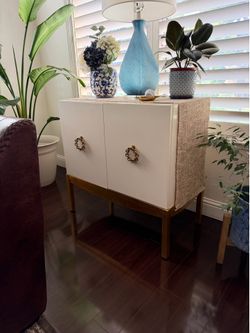 White with gold cabinet.