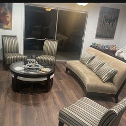 Couch and three chairs