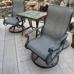 2 Swivel Chairs And 1 Table