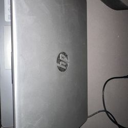 Silver grey HP laptop 