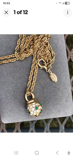 Nolan Miller charm necklace with green+clear crystal ball pendant-goldtone-without/box