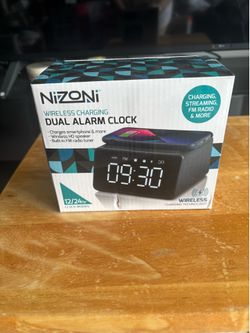 Nizoni Wireless Charging Dual Alarm Clock: Features wireless phone charging pad, built-in speaker, FM radio, snooze, and dual alarms. Shows digital di