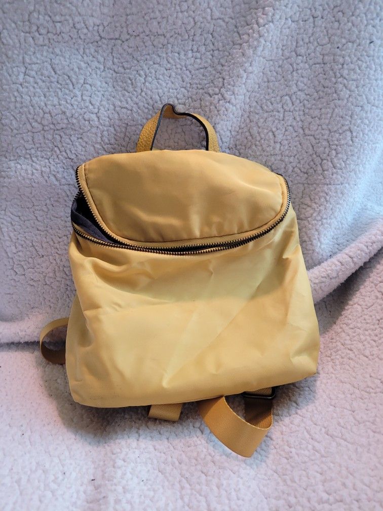 A New Day's yellow polyester Varible Backpack