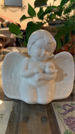 Beautiful cherub candle or plant container