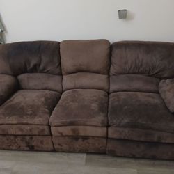 Brown reclining sofa
