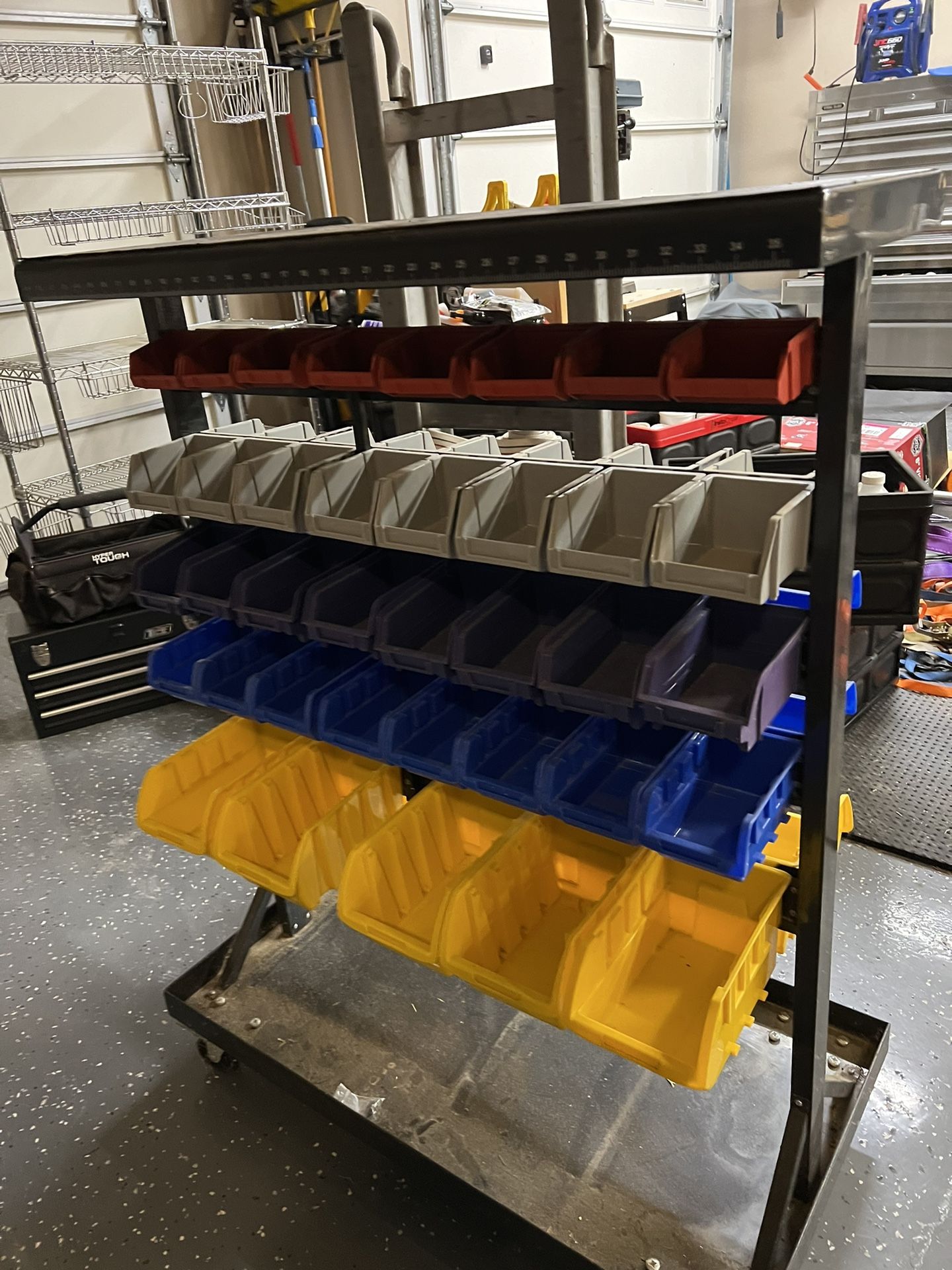 Mobile Double Sided floor Rack With Bins for Sale in Stanwood, WA OfferUp