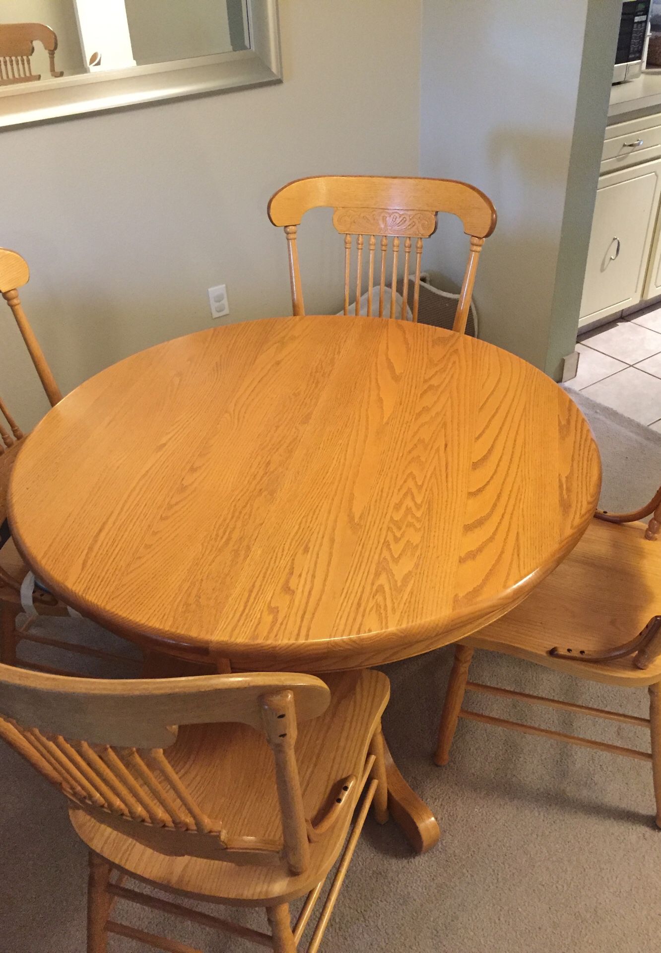 Oak dining room extendable table set and 4 chairs