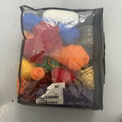 Assortment of Various Styles and Shades of Yarn