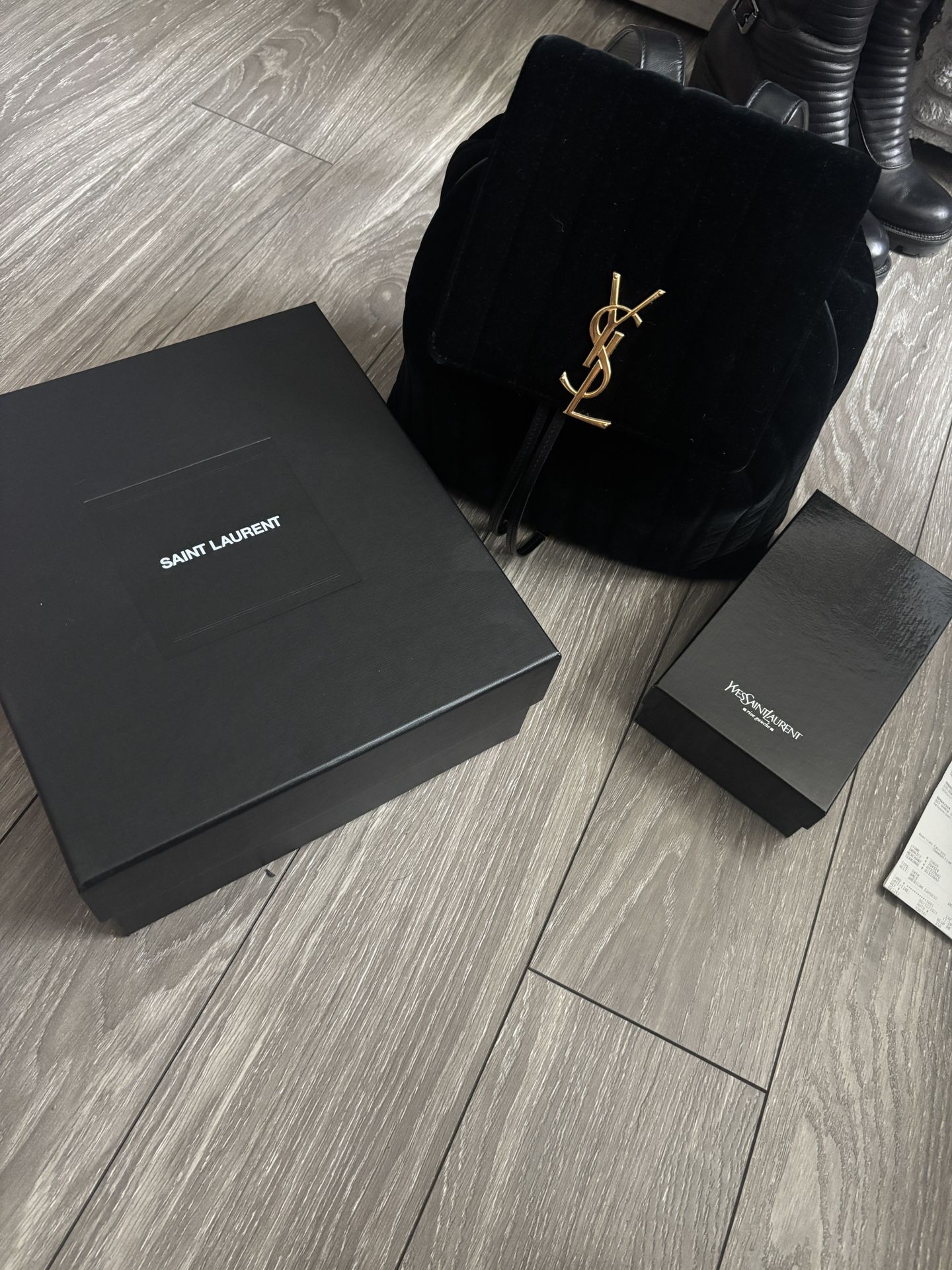 Saint Laurent backpack, shoes, and wallet