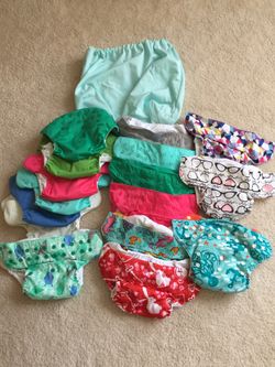 16 bumgenius cloth diapers (pocket) prints are new without tags