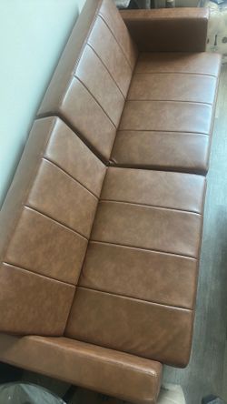 Brown leather wide couch