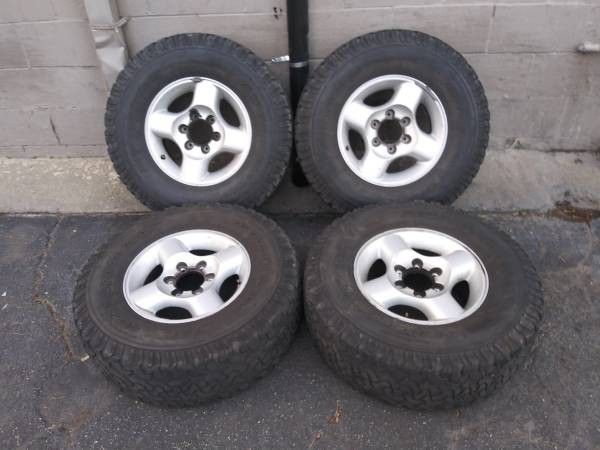 6 lug aluminum Nissan Frontier rims and tires. 16 inch for Sale in ...