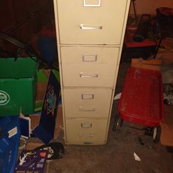 4 Drawer Steel Filing Cabinet. About 5 Feet Tall Perfect Condition