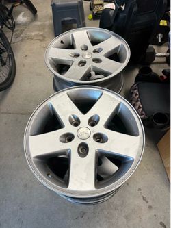 A set of 4 Jeep alloy 18inch wheels.