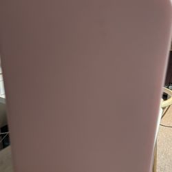 Pink mini fridge