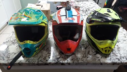 3 motocross helmets