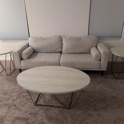 Small couch with coffee and 2 side tables