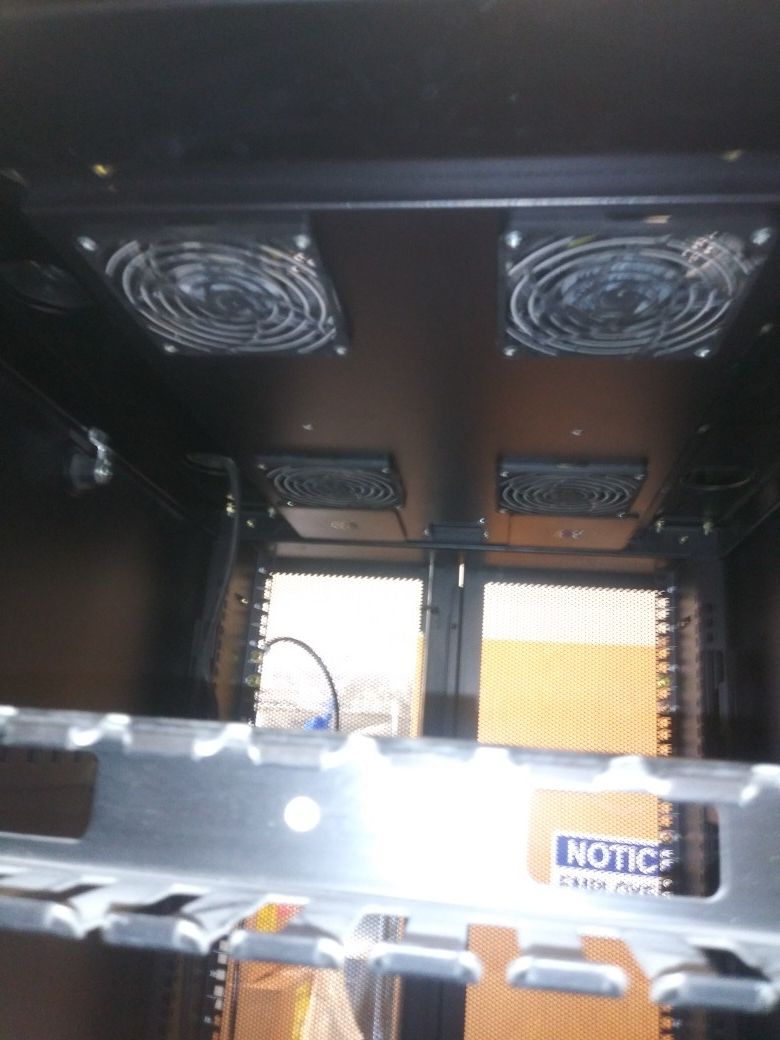 Apc 7' enclosed computer rack with internal fan kit