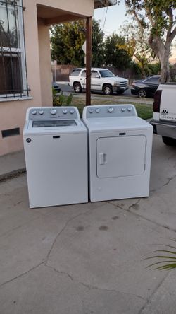 Washer and gas dryer