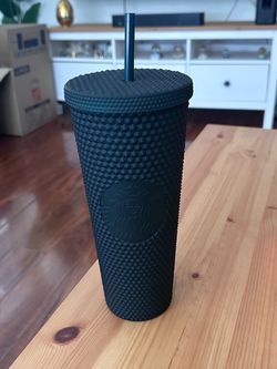 Dark green studded Starbucks tumbler