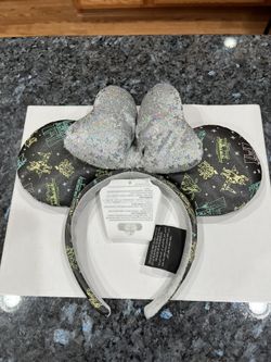 Disney Parks Celebrating 100 Years of Wonder Minnie Mouse Ears Headband.  Brand new with tags.  Smoke free  