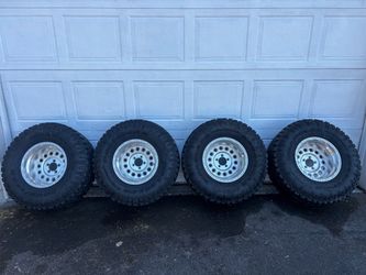Goodyear Wrangler Duratrac 33x12.50R15LT with Rims