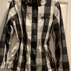 Woman’s Hooded Zippered Jacket, Calvin Klein Brand,  Size Small, Zippered Pockets, Wind Breaker Type Material, Has Various Adjusting Cords