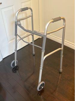 Two button folding walker