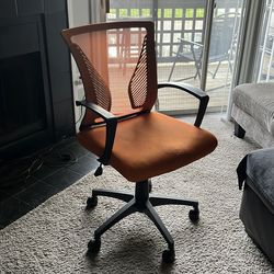 Orange and black gaming/desk chair