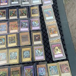 3 blue eyes in 1 is $250 each. 1 blue eyes $150. 5 exodias 1996 1st Edition $650 red eyes $150! Dark Magician $150! Each. Slap $80! Yu-Gi-Oh cards