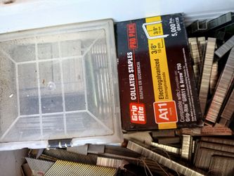 Box filled with nails and staples