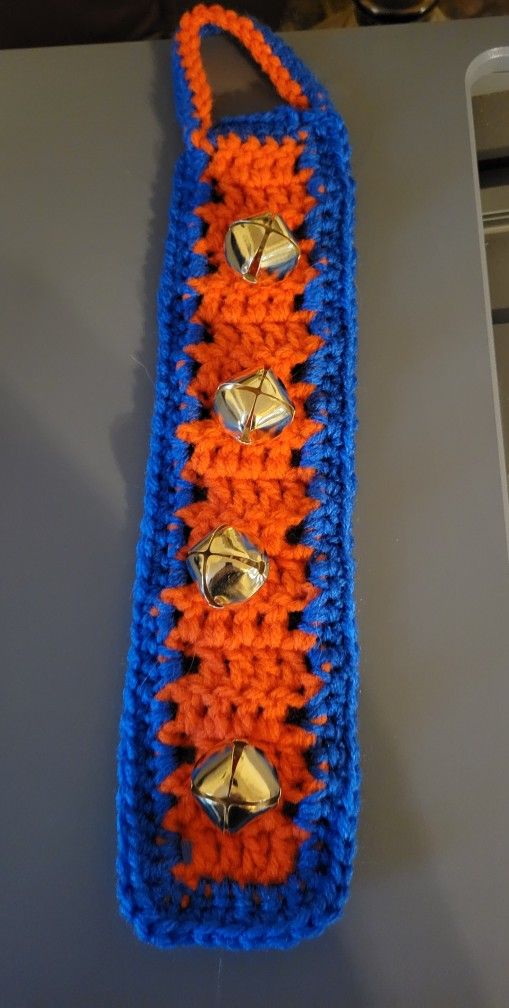 Hand crocheted pet potty training door bell with jingle bells 