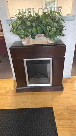 Electric Fireplace with Dark Wood Mantel
