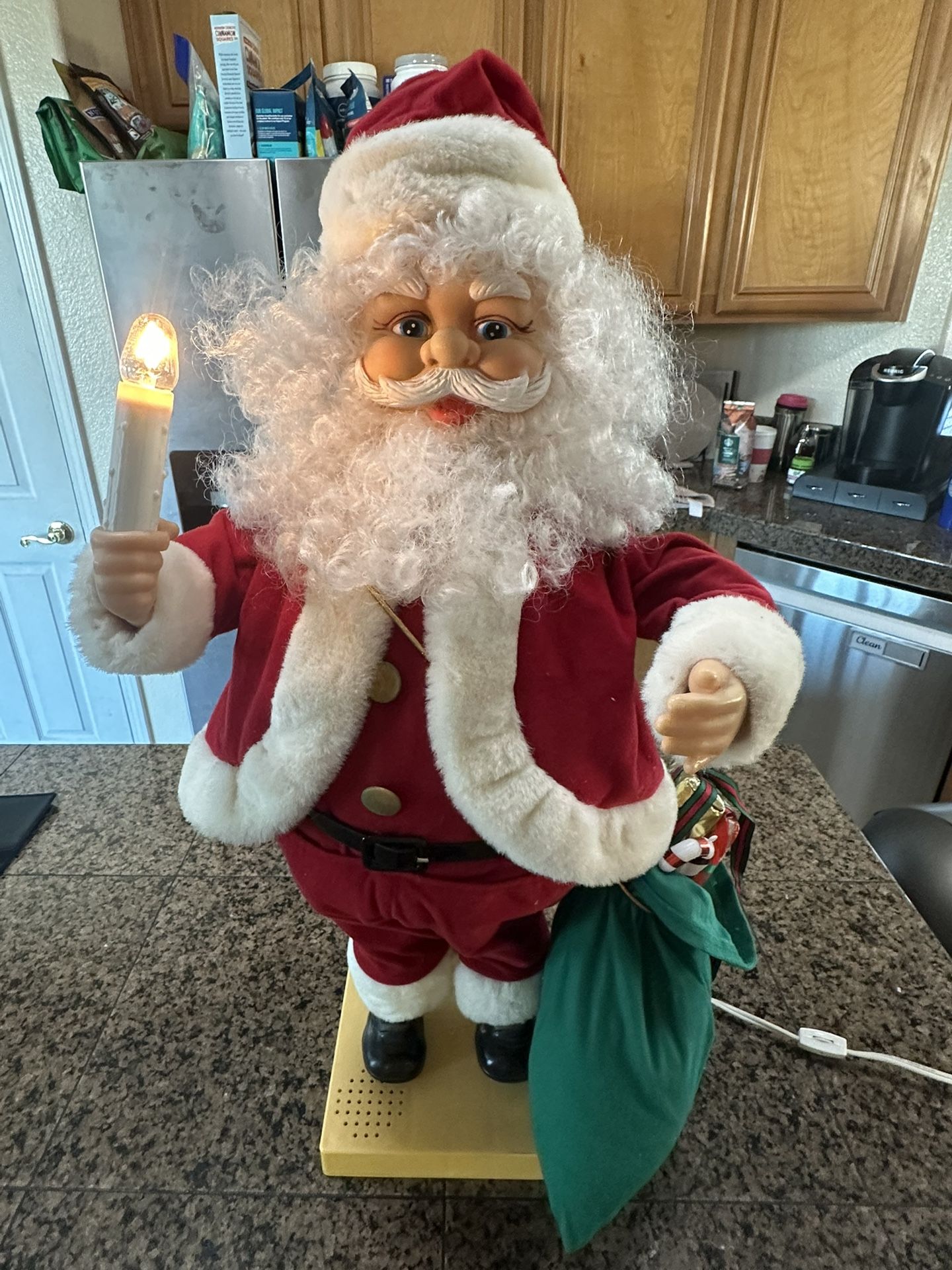 Vintage motion at animated Santa with working lightbulb. Over 2 feet tall.