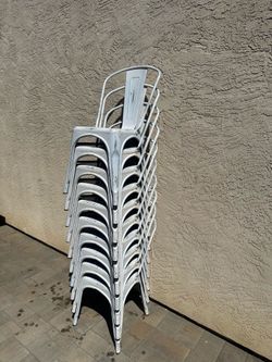 Ten industrial metal chairs